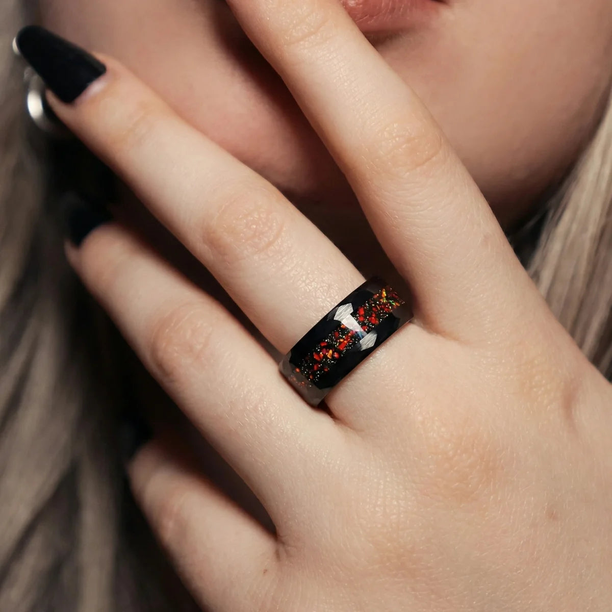 Woman wearing 8mm Black Hammered Opal Tungsten Ring
