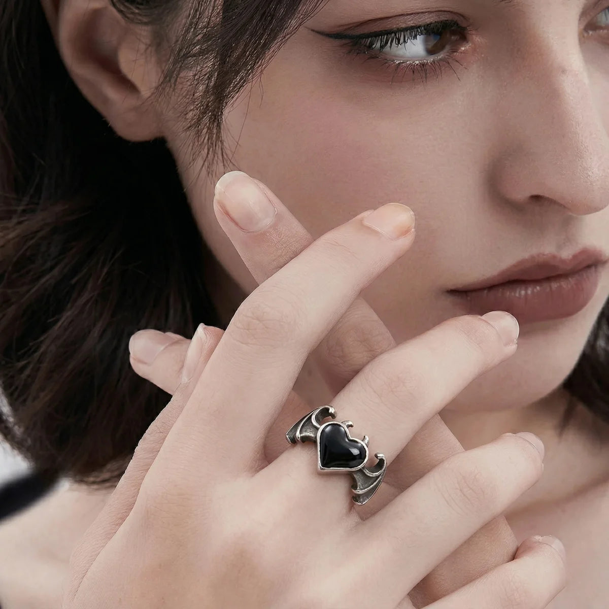 Woman Wearing Bat Wing Heart Ring Dark Aesthetic Womens Gothic Jewelry