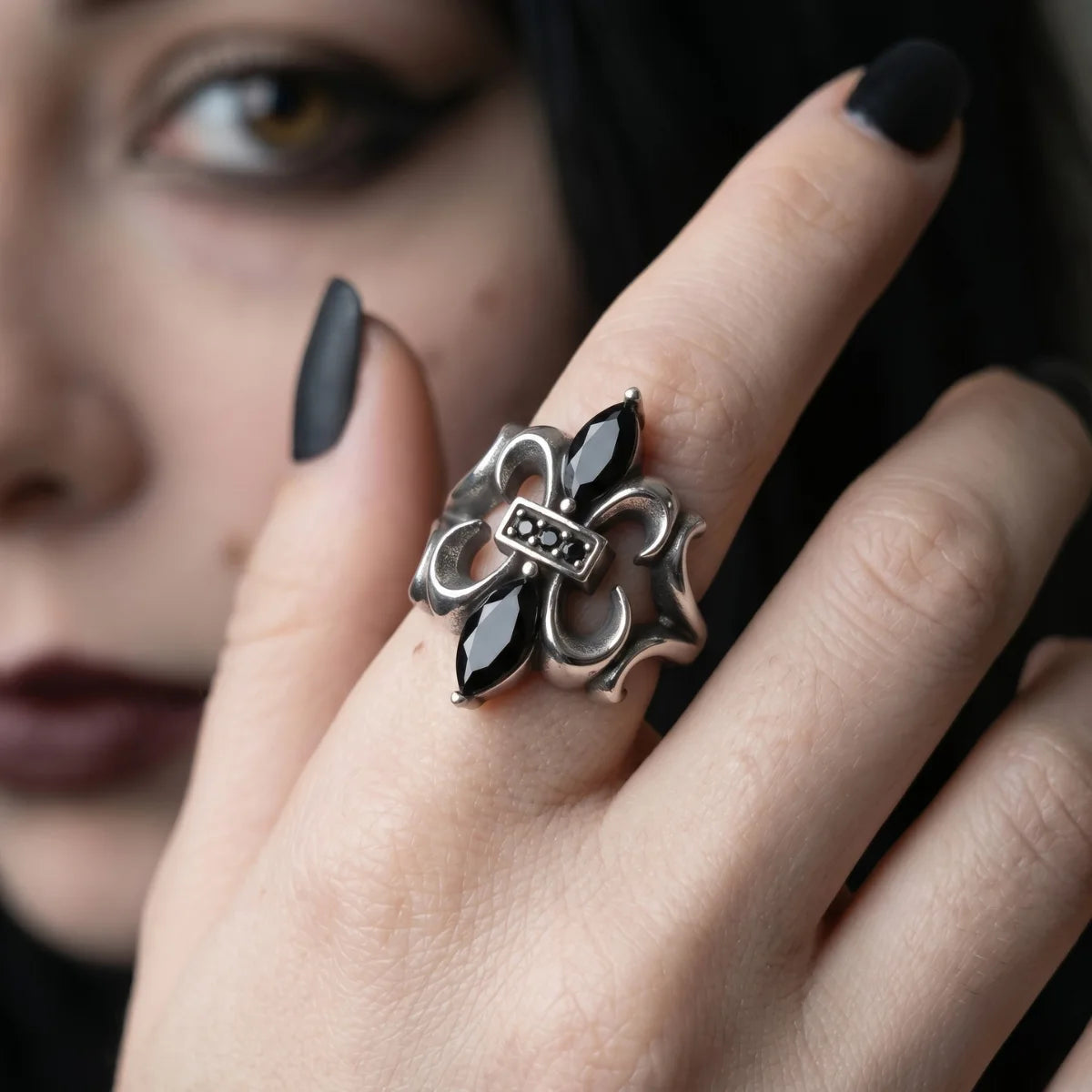Woman Wearing Black Stone Fleur De Lis Ring Black Nails Gothic Statement Jewelry