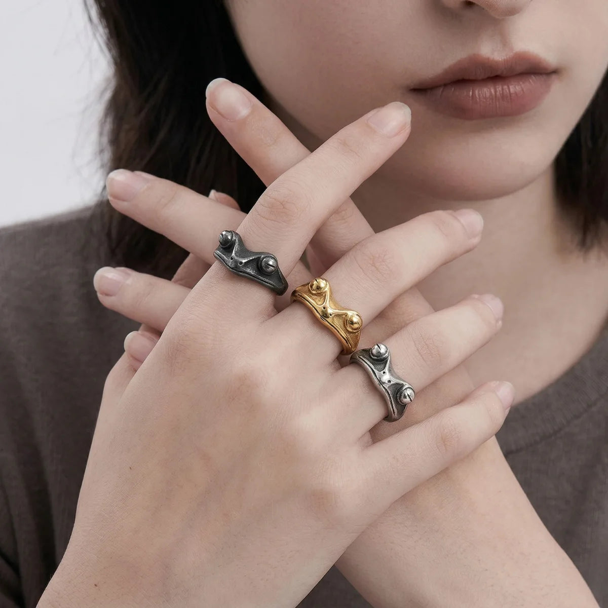 Woman Wearing Frog Rings Collection Silver Gold Stackable Animal Jewelry