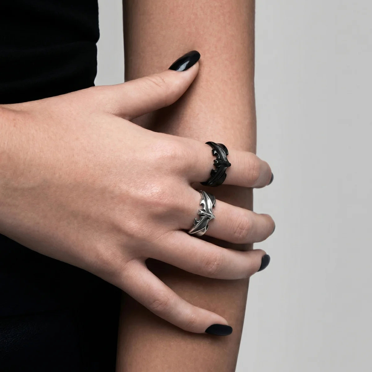 Woman Wearing Minimalist Bat Rings Duo Black Nails Dark Aesthetic Womens Jewelry