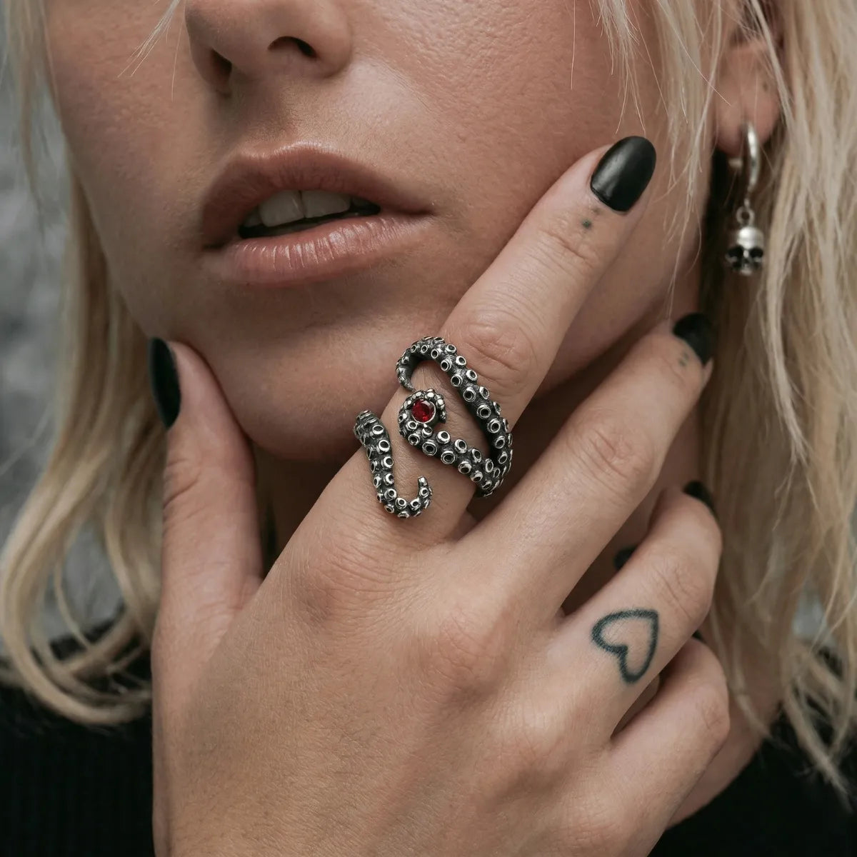 Woman wearing silver Octopus Tentacle Ring gothic jewelry