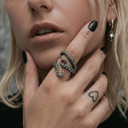 Woman wearing silver Octopus Tentacle Ring gothic jewelry
