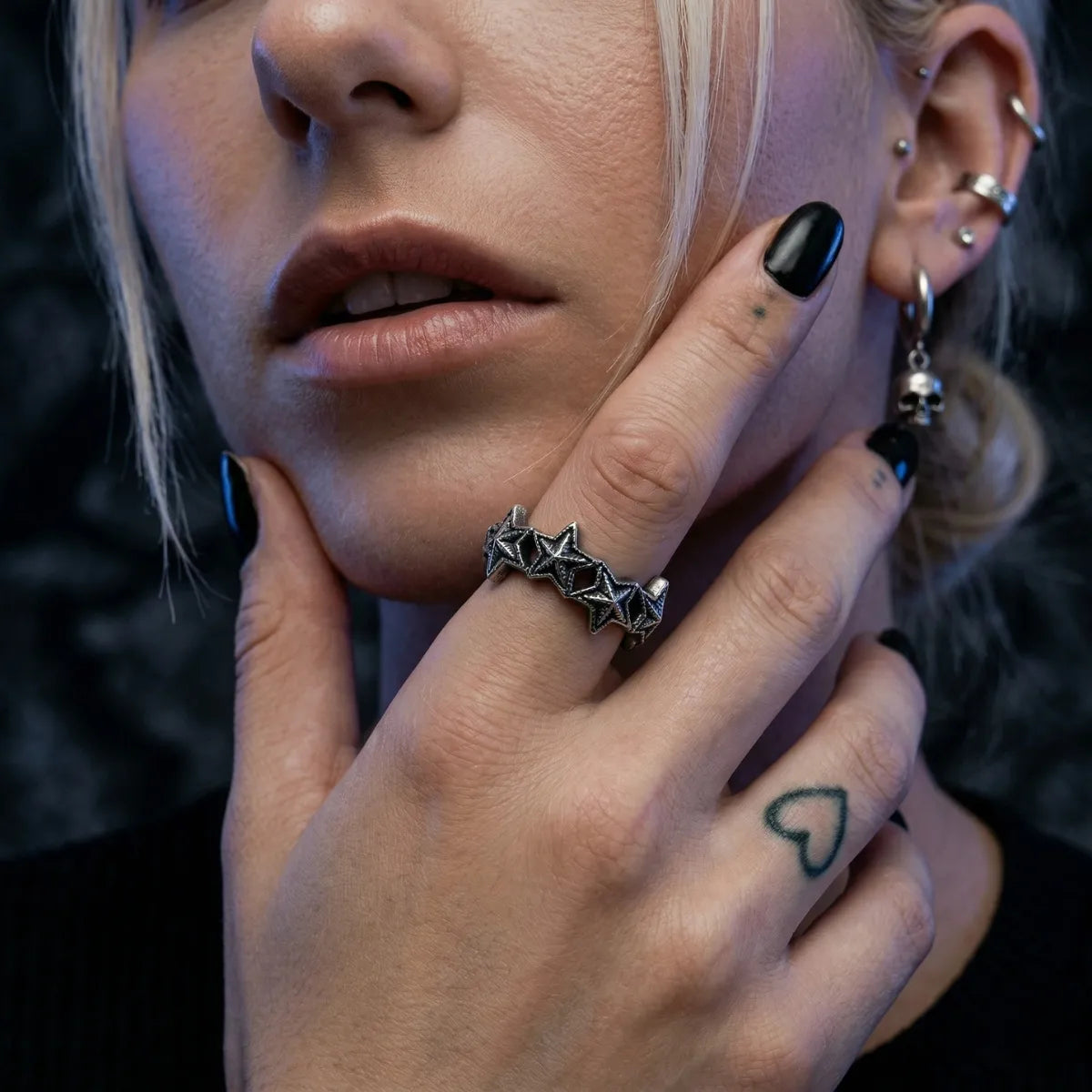 Woman wearing silver Punk Star Ring gothic jewelry