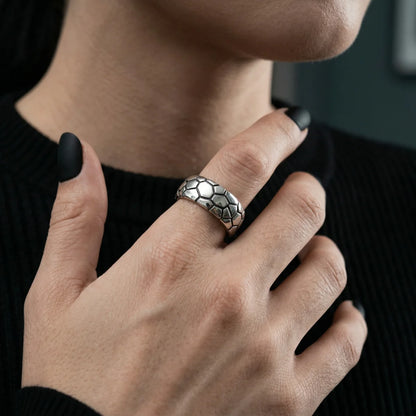 Woman wearing silver Shattered Snake Scale Band gothic jewelry