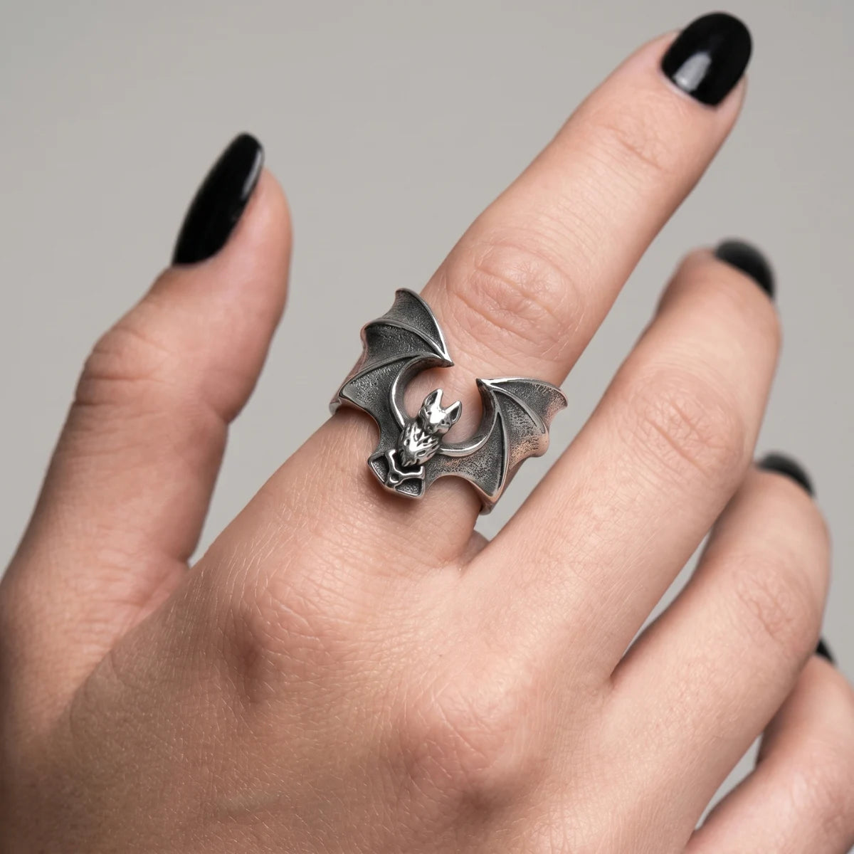 Woman Wearing Vampire Bat Ring Silver Black Nails Dark Aesthetic Womens Jewelry